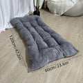 Oversized Plush Sofa Dog Bed draped over a sofa arm showing its soft plush fabric texture