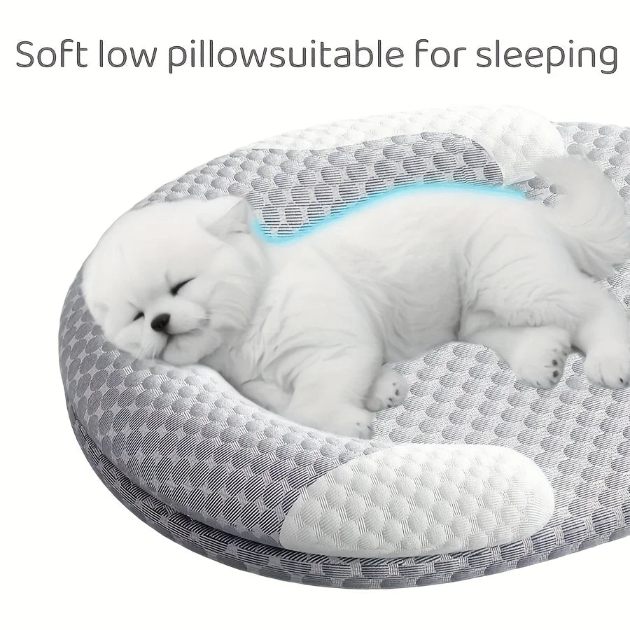 Black and white cat curled up sleeping in the Cooling Ice-Silk Pet Bed